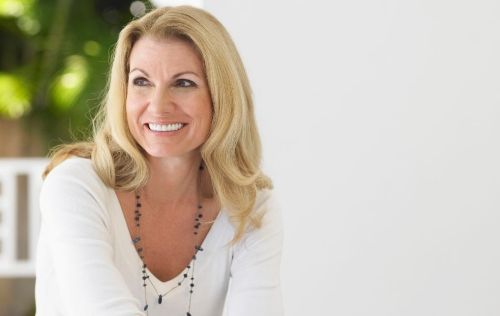 older woman smiling, hopeful before Mohs surgery